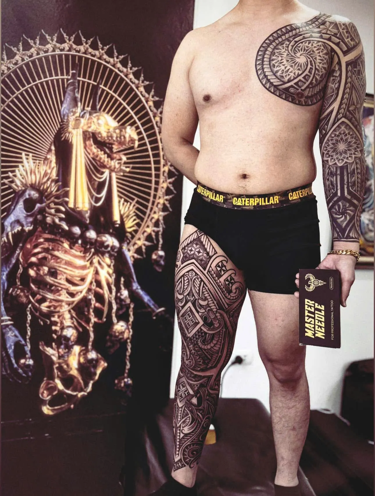 Maori and Polynesian blackwork covering the shoulder, arm and full leg, done at GOAT Tattoo Studio in Hanoi.