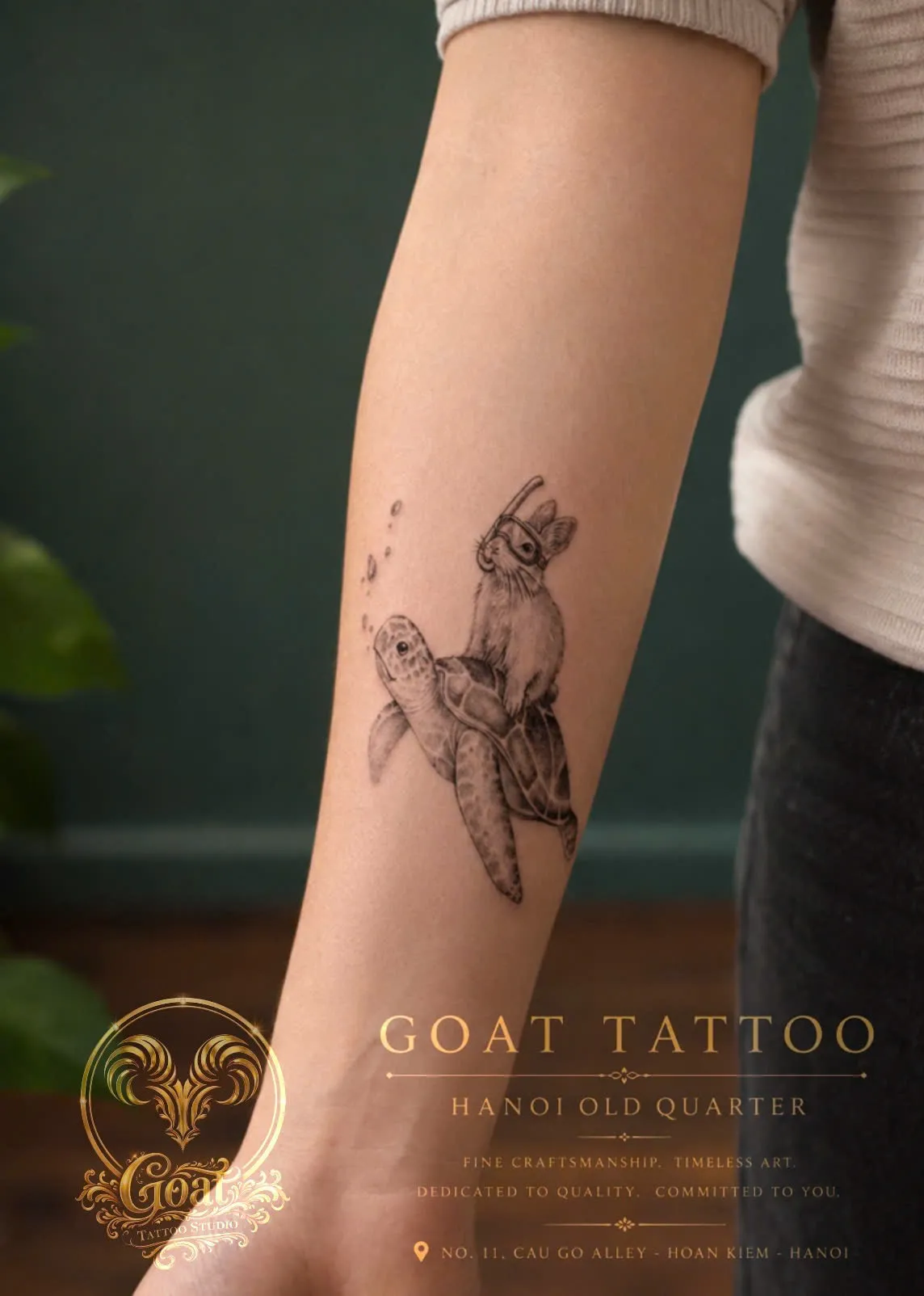 Black and grey illustrative tattoo of a rabbit snorkeling on a turtle's back, on the forearm, by GOAT Tattoo Studio Hanoi.