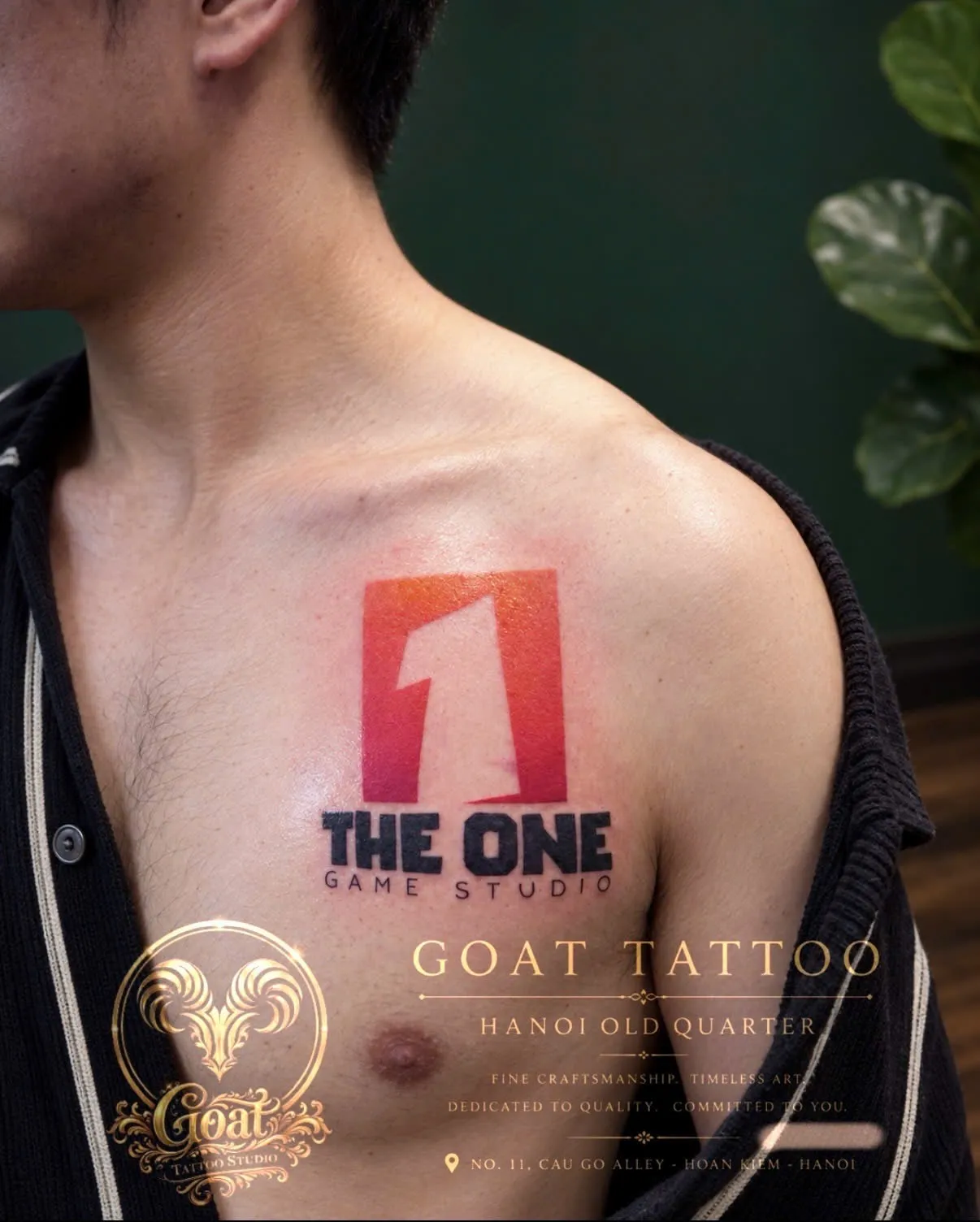 A brand logo tattoo for The One Game Studio, tattooed on the chest, by GOAT Tattoo Studio Hanoi.